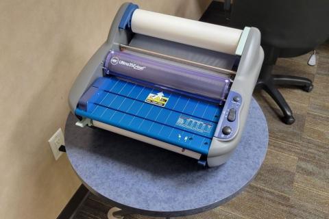 Laminator machine.