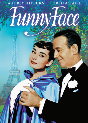 Funny Face movie poster. Fred Astaire holding Audrey Hepburn with the eiffel tower in the background.