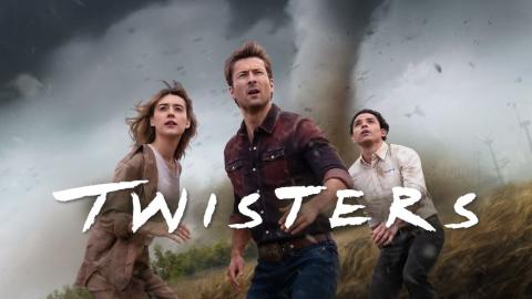 Twisters movie poster. Shows a twister in the background of a cornfield and three people running from it.