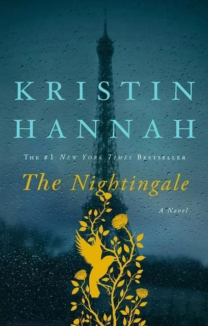 The Nightingale by Kristin Hannah cover. A view of the outline of the Eiffel Tower through a rainy window.