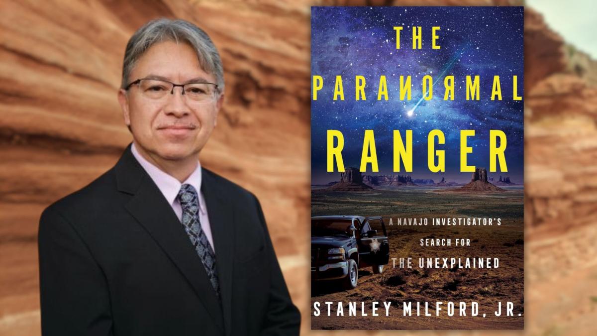 Stanley Milford, Jr with his book Paranormal Ranger.